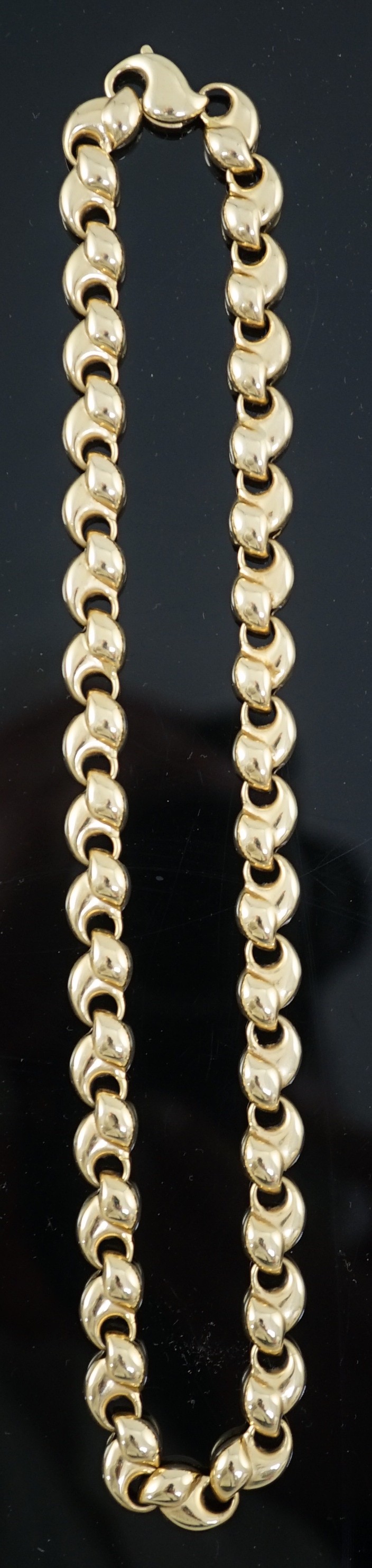 An 18ct two colour gold shaped link necklace